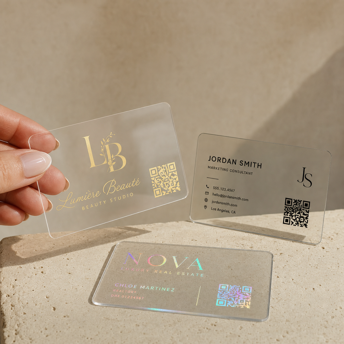 Custom transparent business cards with gold, black and holographic printing