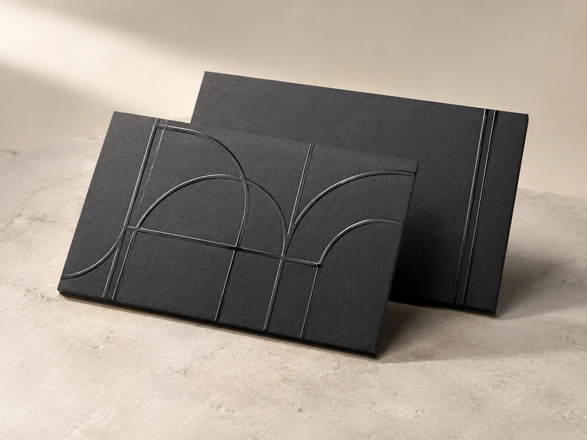 Signature matte business cards with raised gloss detail